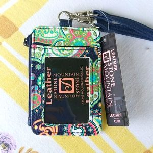 New w/tag, Leather, Paisley, Lanyard w/zipper pouch, and photo and card slots.